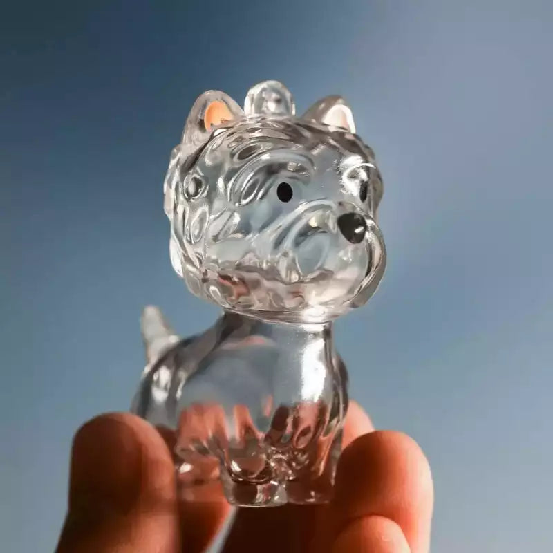 clear pet fur keepsake capsule close-up in hand
